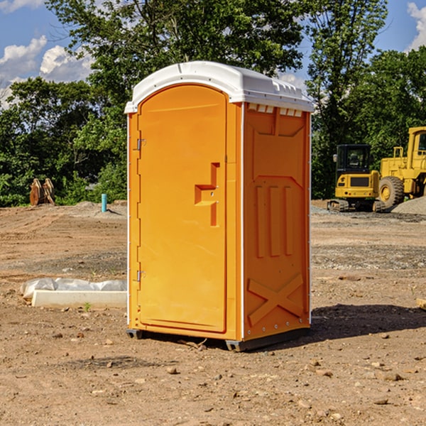 how often are the portable restrooms cleaned and serviced during a rental period in McCune